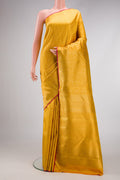 Pure Silk Pure Zari Gold Dual Tone Kanjivaram Saree with Zari Brocade on the body and Zari Border.  displayed on a mannequin