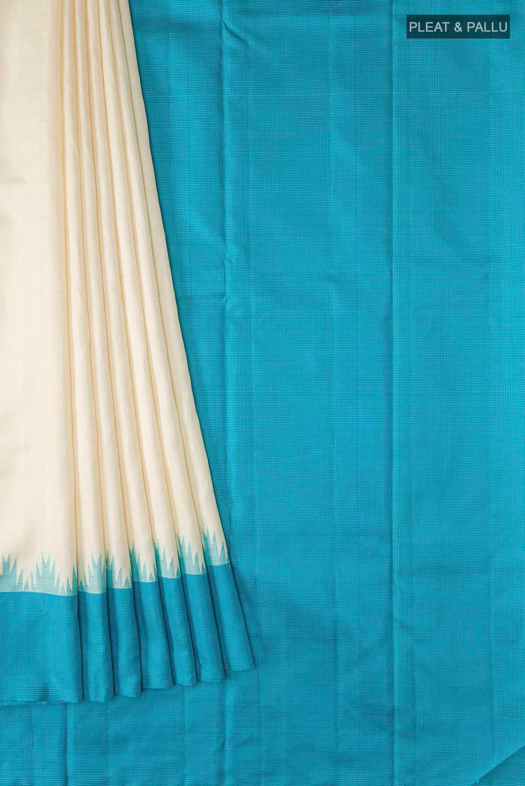 Pleats and pallu of Cream Kanchipuram Silk Saree with Plain Body and Temple Border