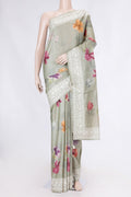 Green Tussar Silk Saree with Floral Print on the body and Embroidery Border displayed on a mannequin
