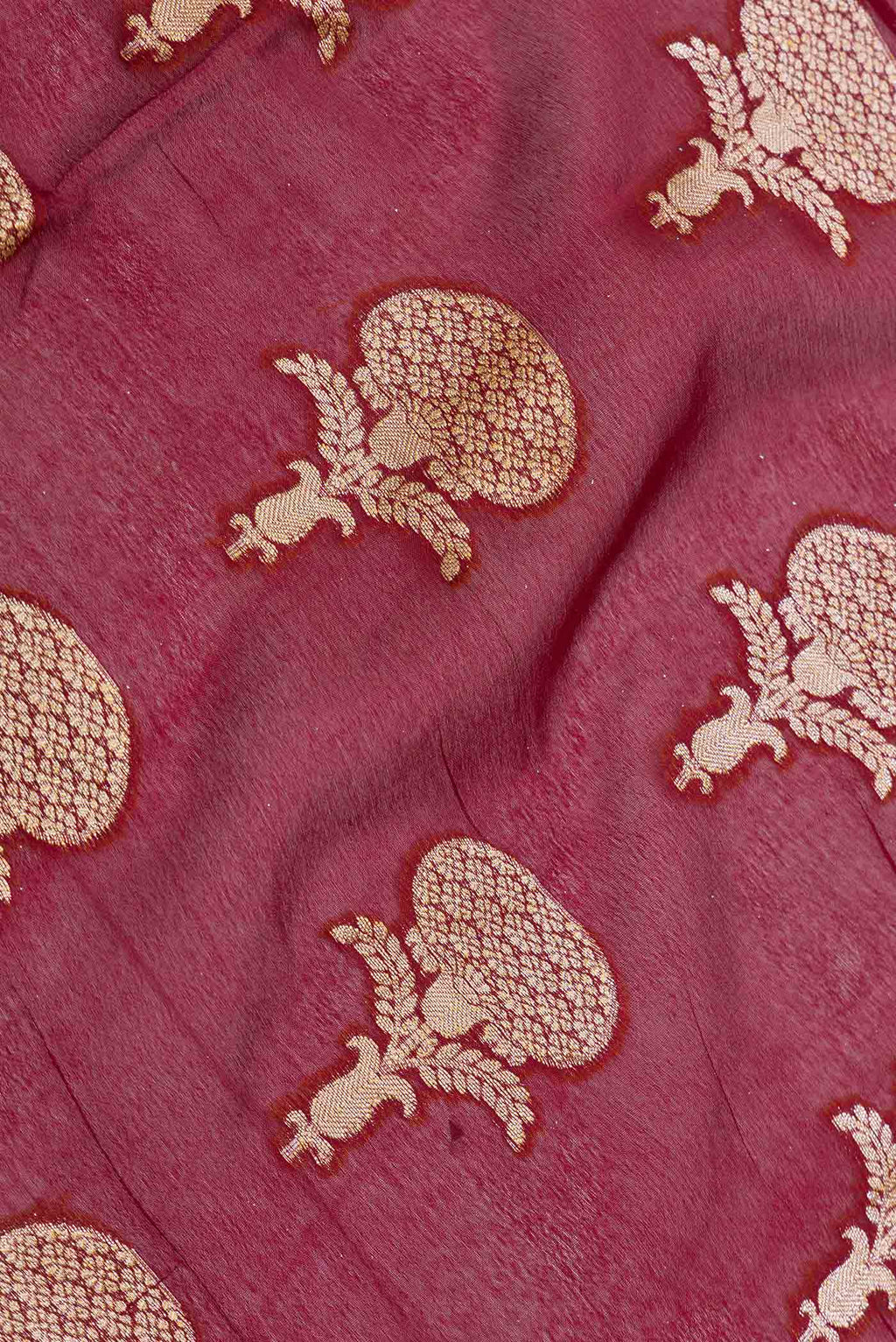 Close up of Maroon Dual Tone Georgette Saree with Zari Brocade on the body and Zari Border displaying folds
