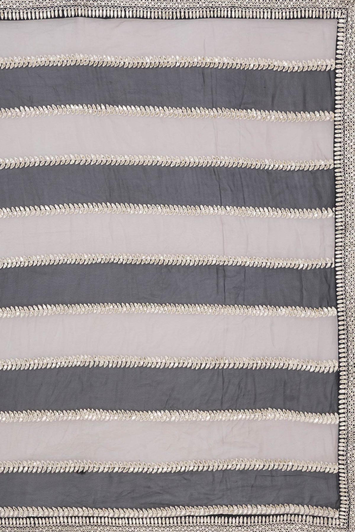Close up image of the pallu of Black Dual Tone Mysore Georgette Saree with Embroidery on the body and Embroidery Border. 