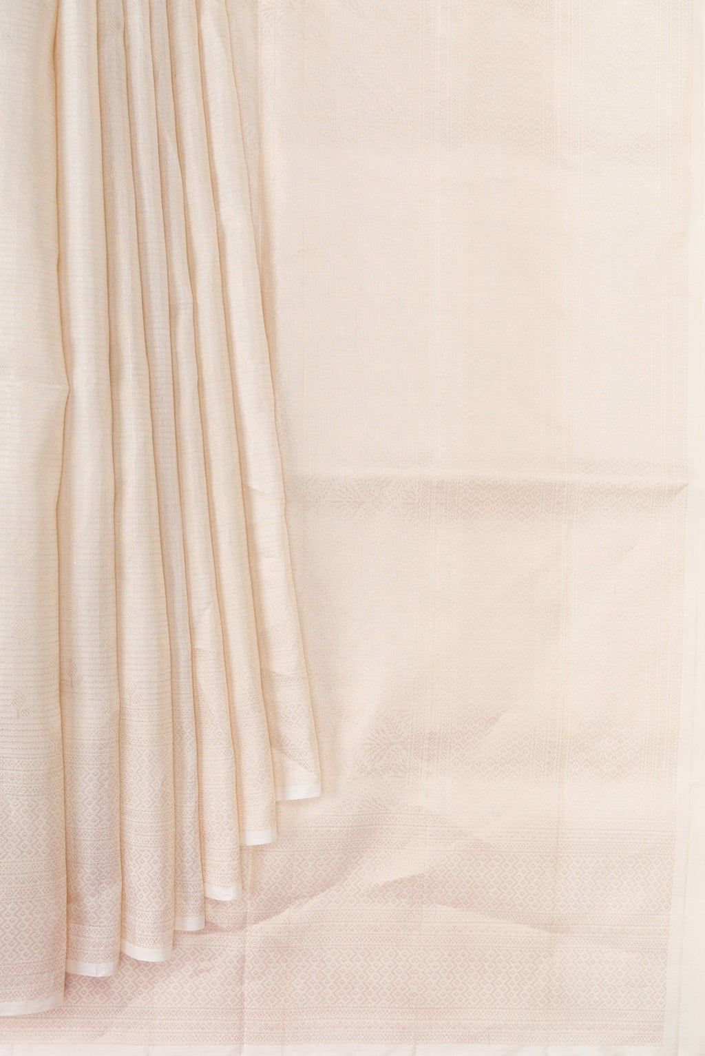 Pleats and pallu of Beige Dual Tone Soft Silk Saree with Zari Brocade on the body and Fancy Border. 