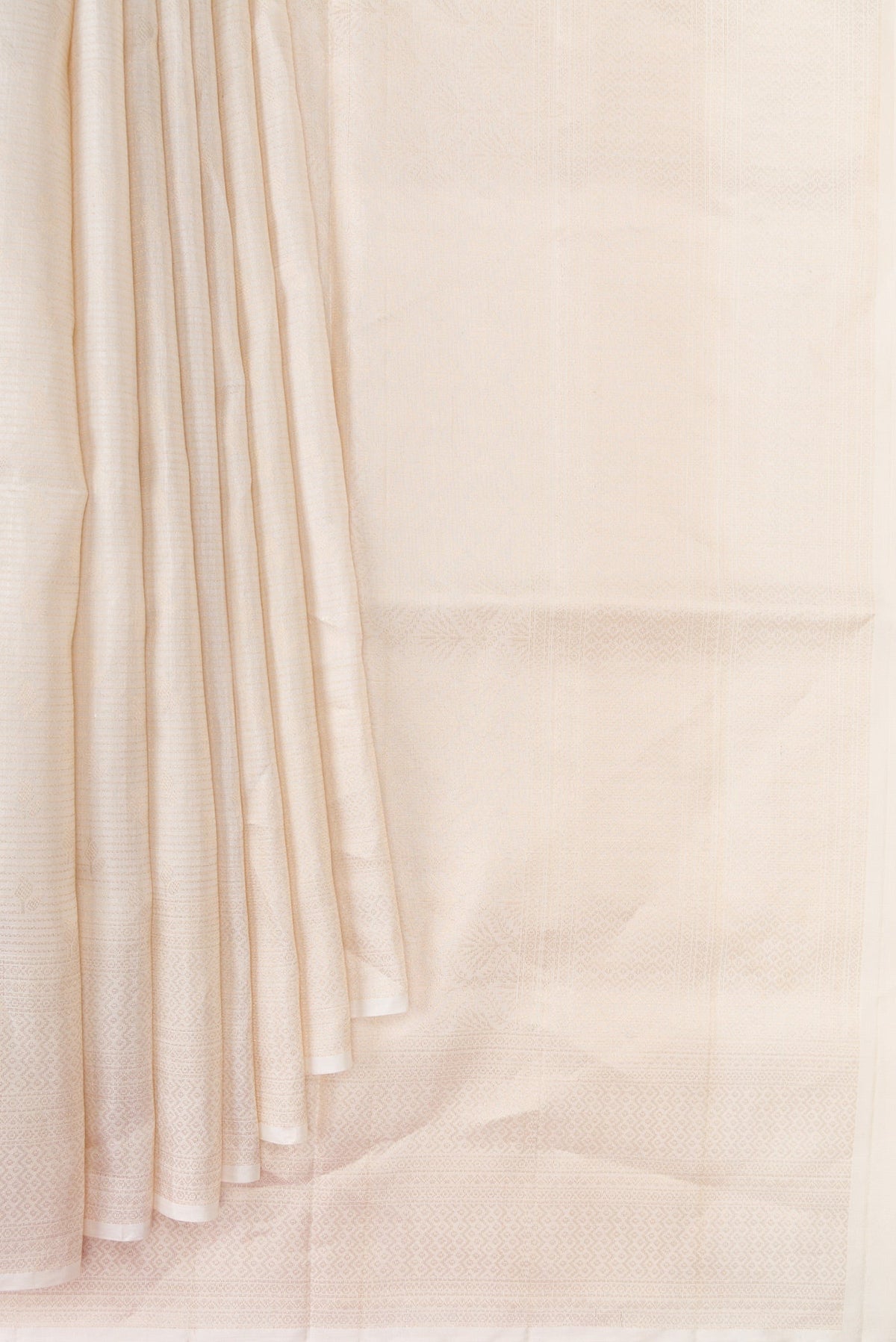 Pleats and pallu of Beige Dual Tone Soft Silk Saree with Zari Brocade on the body and Fancy Border. 