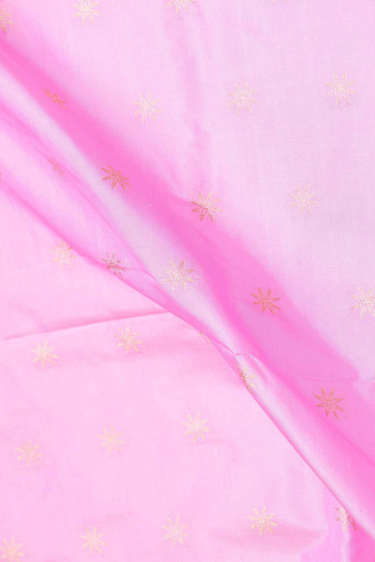 Close up of Pink Dual Tone Paithani Silk Saree with Zari Butta on the body and Paithani Border displaying folds