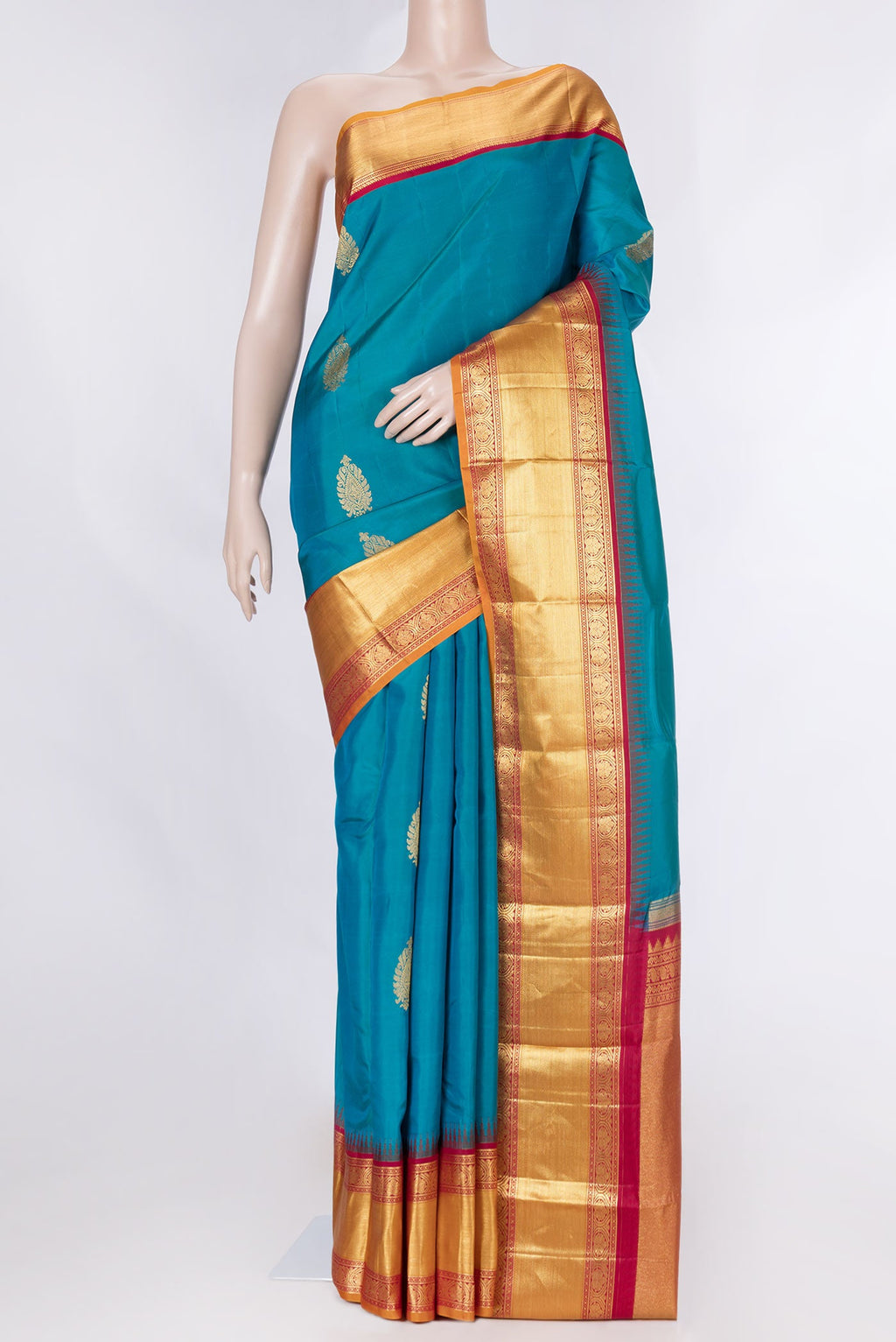 Peacock Blue Dual Tone Kanchipuram Saree with Zari Butta on the body and Zari Border displayed on a mannequin