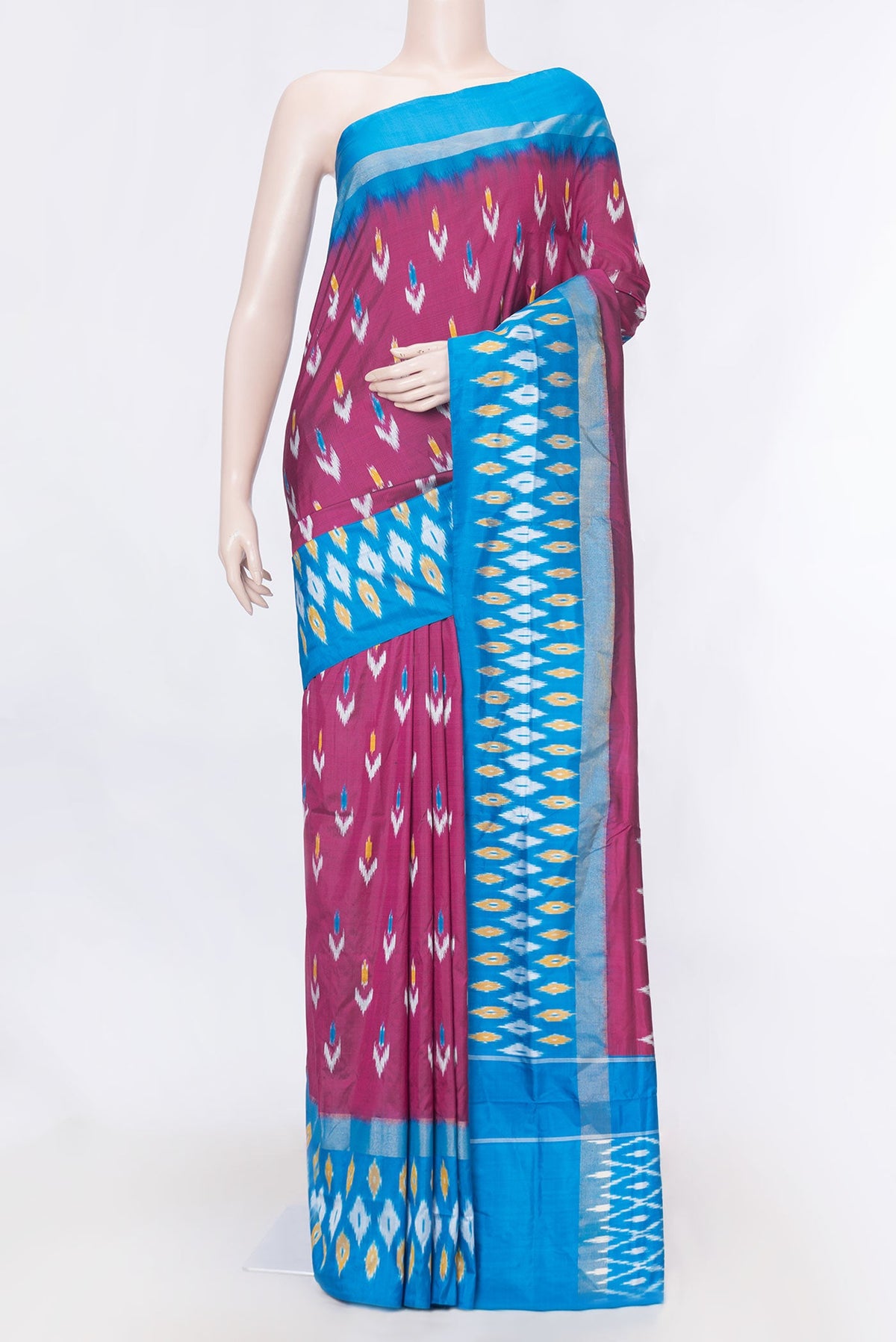Pink Dual Tone Pochampally Silk Saree with Ikat Print on the body and Ikat Border displayed on a mannequin