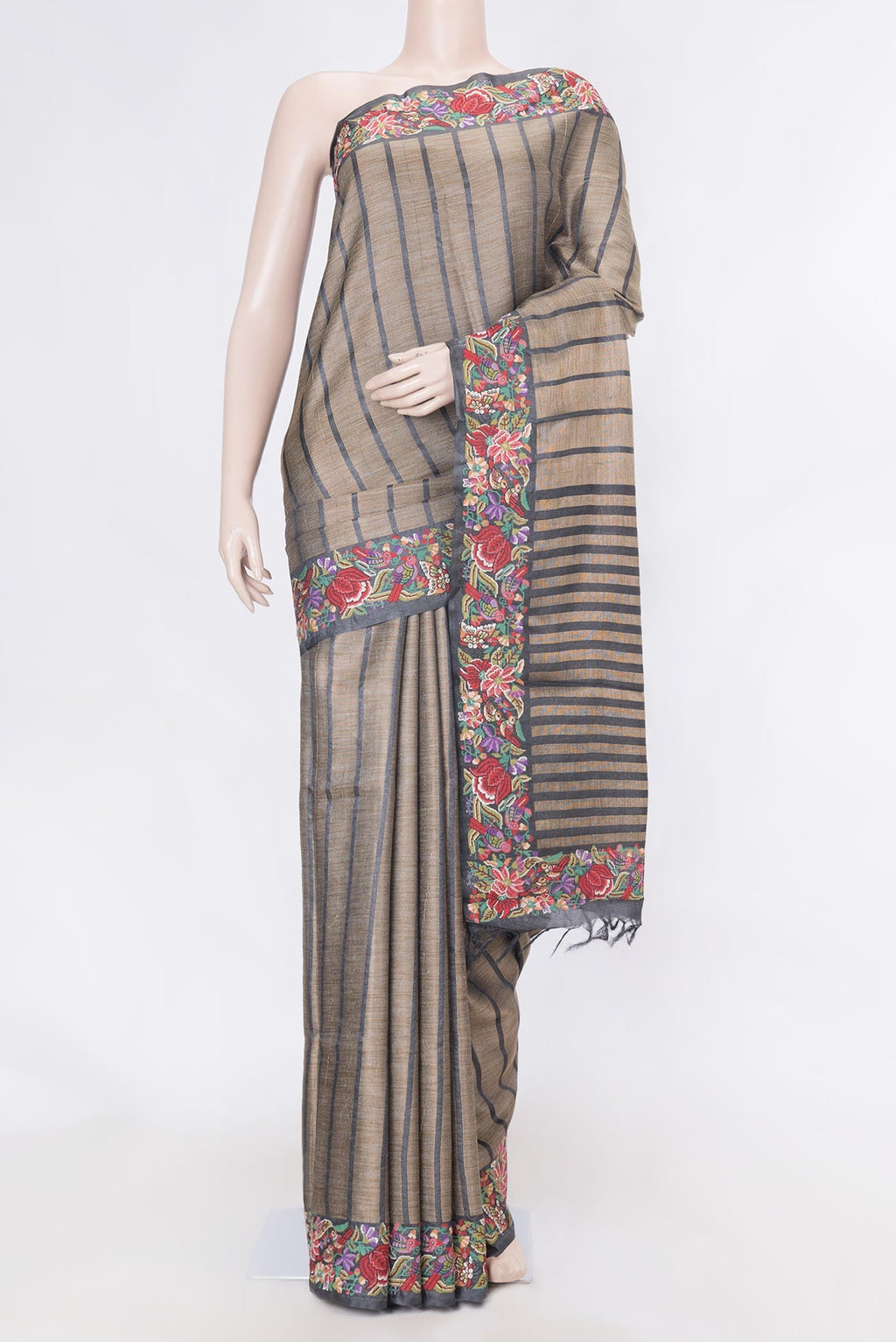 Black Dual Tone Tussar Silk Saree with Stripes on the body and Embroidery Border displayed on a mannequin