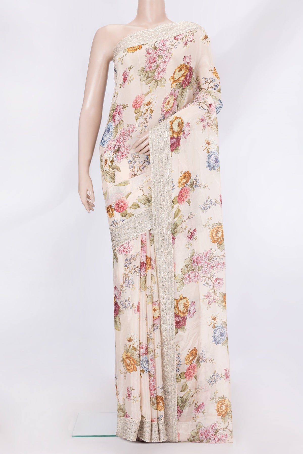 Rose Gold Dual Tone Mysore Crepe Saree with Printed design on the body and Embroidery Border.  displayed on a mannequin
