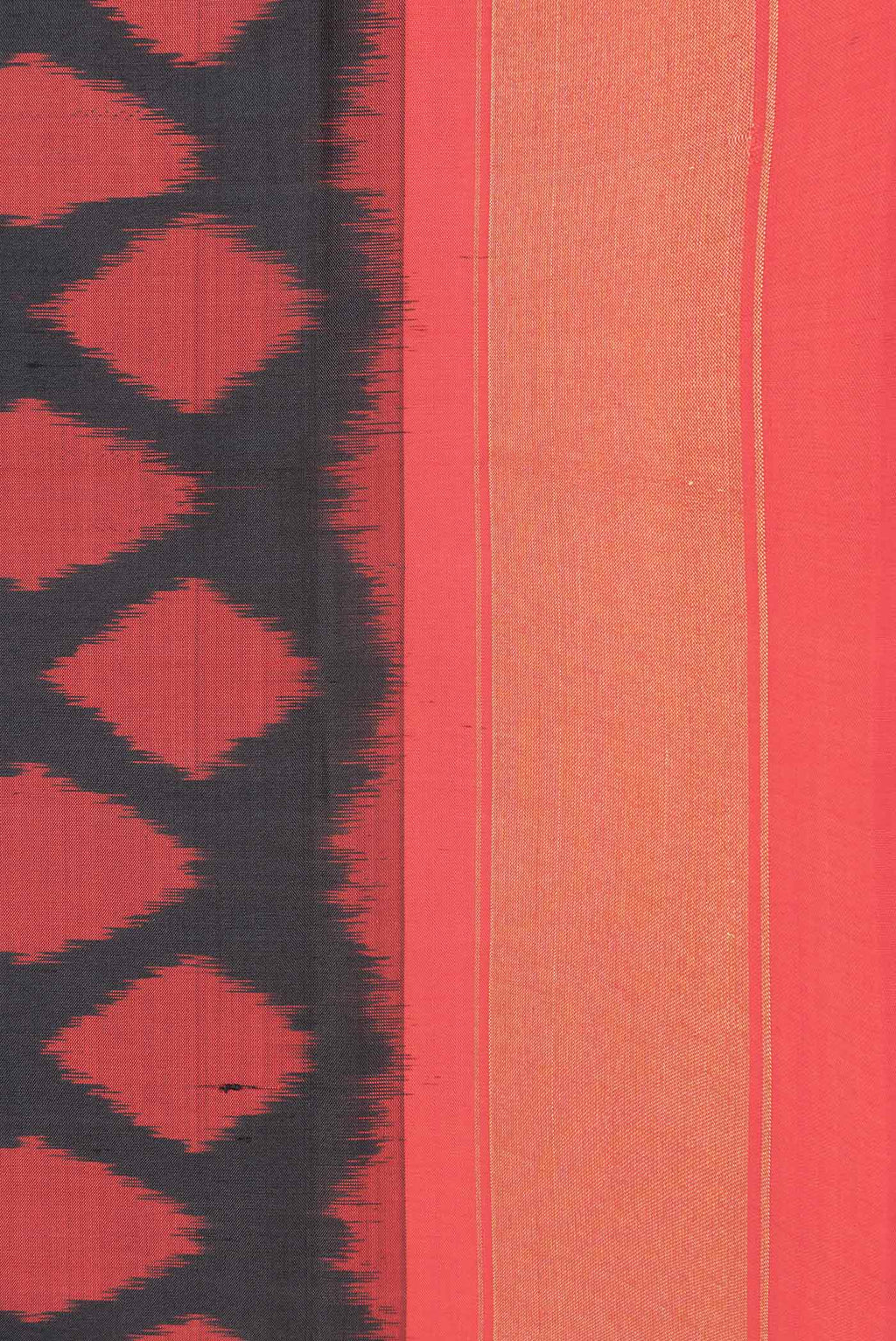 Border image of Black Dual Tone Double Ikat Saree with Ikat Print on the body and Zari Border