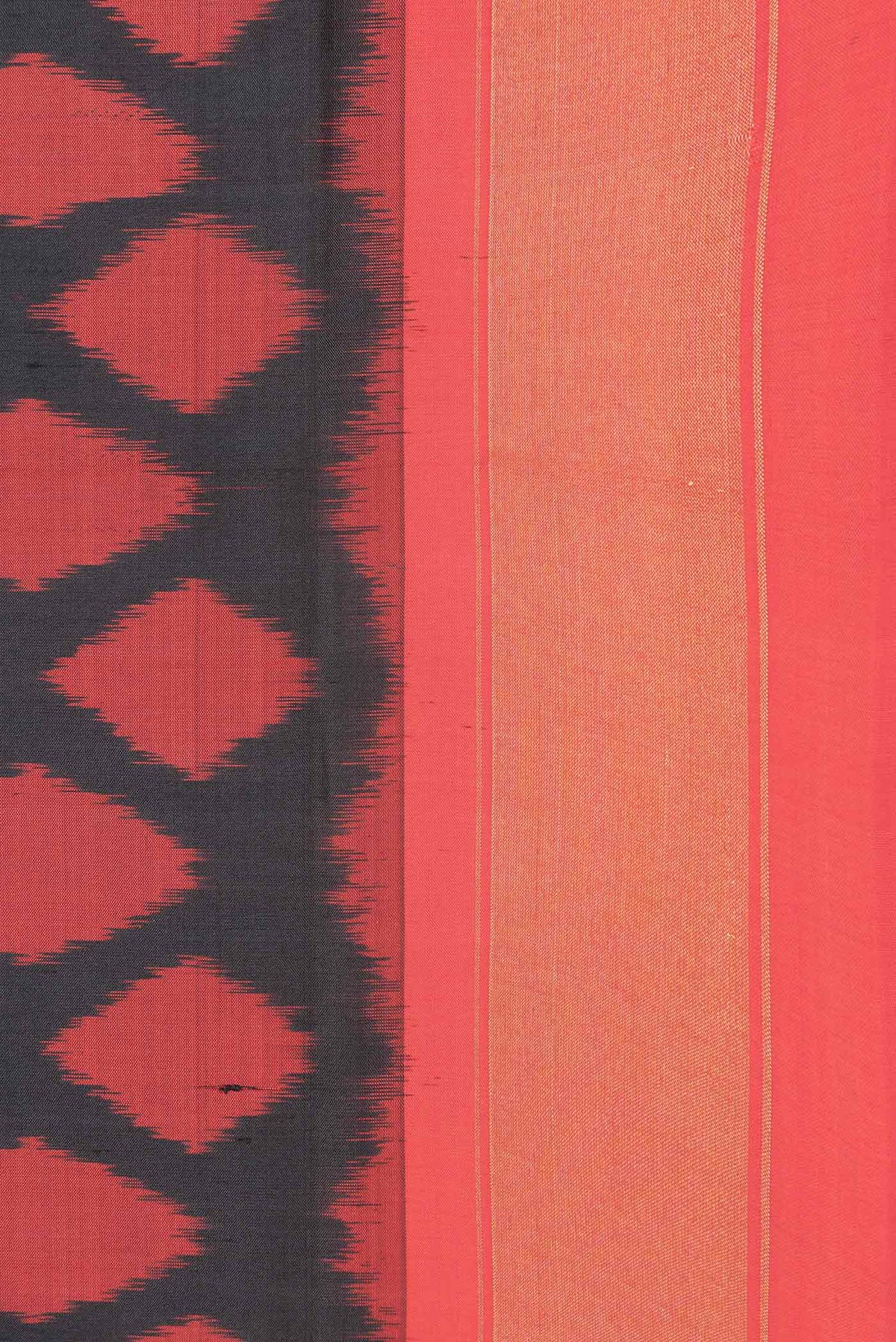 Border image of Black Dual Tone Double Ikat Saree with Ikat Print on the body and Zari Border