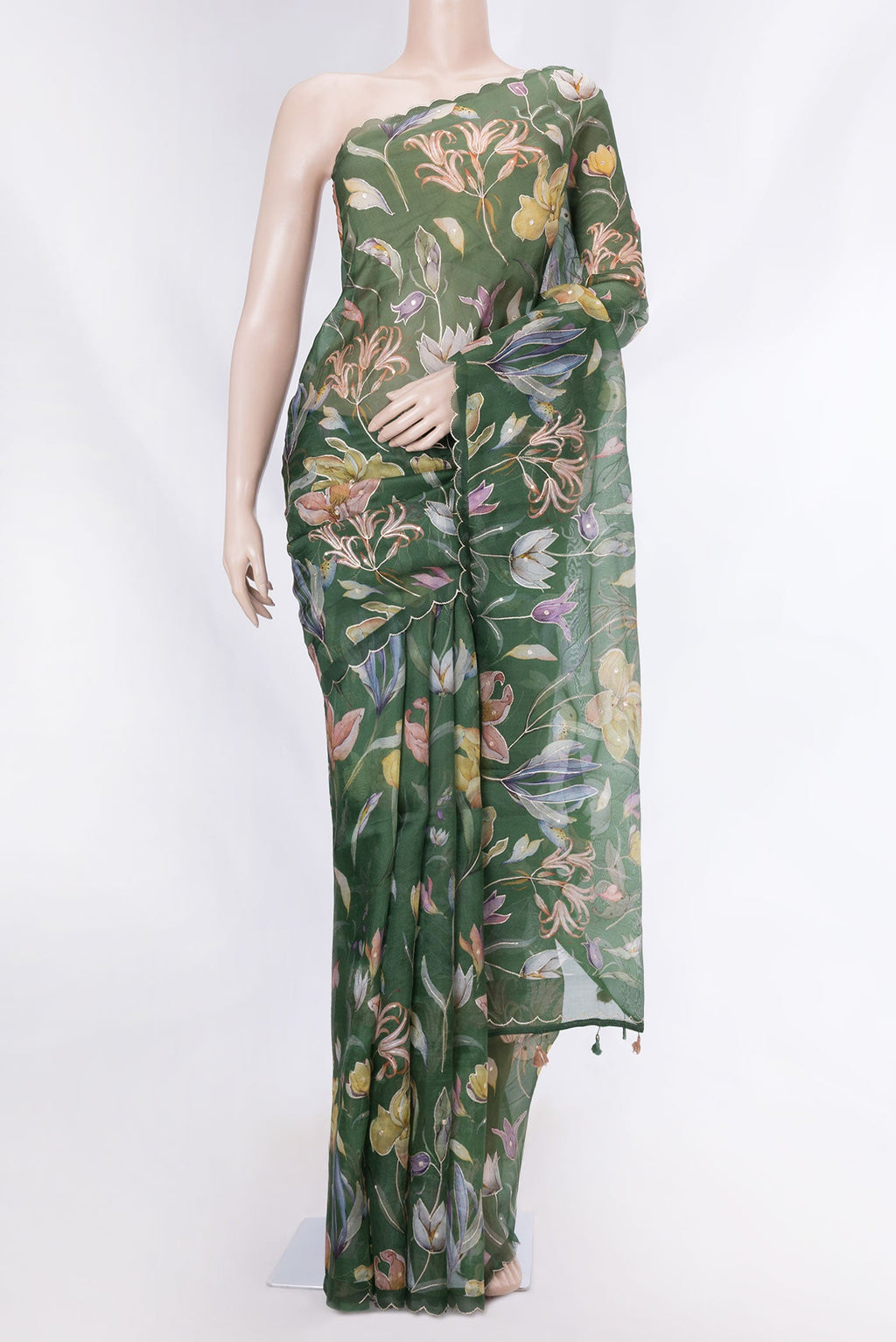 Green Dual Tone Organza Silk Saree with Printed design on the body and Embroidery Border displayed on a mannequin