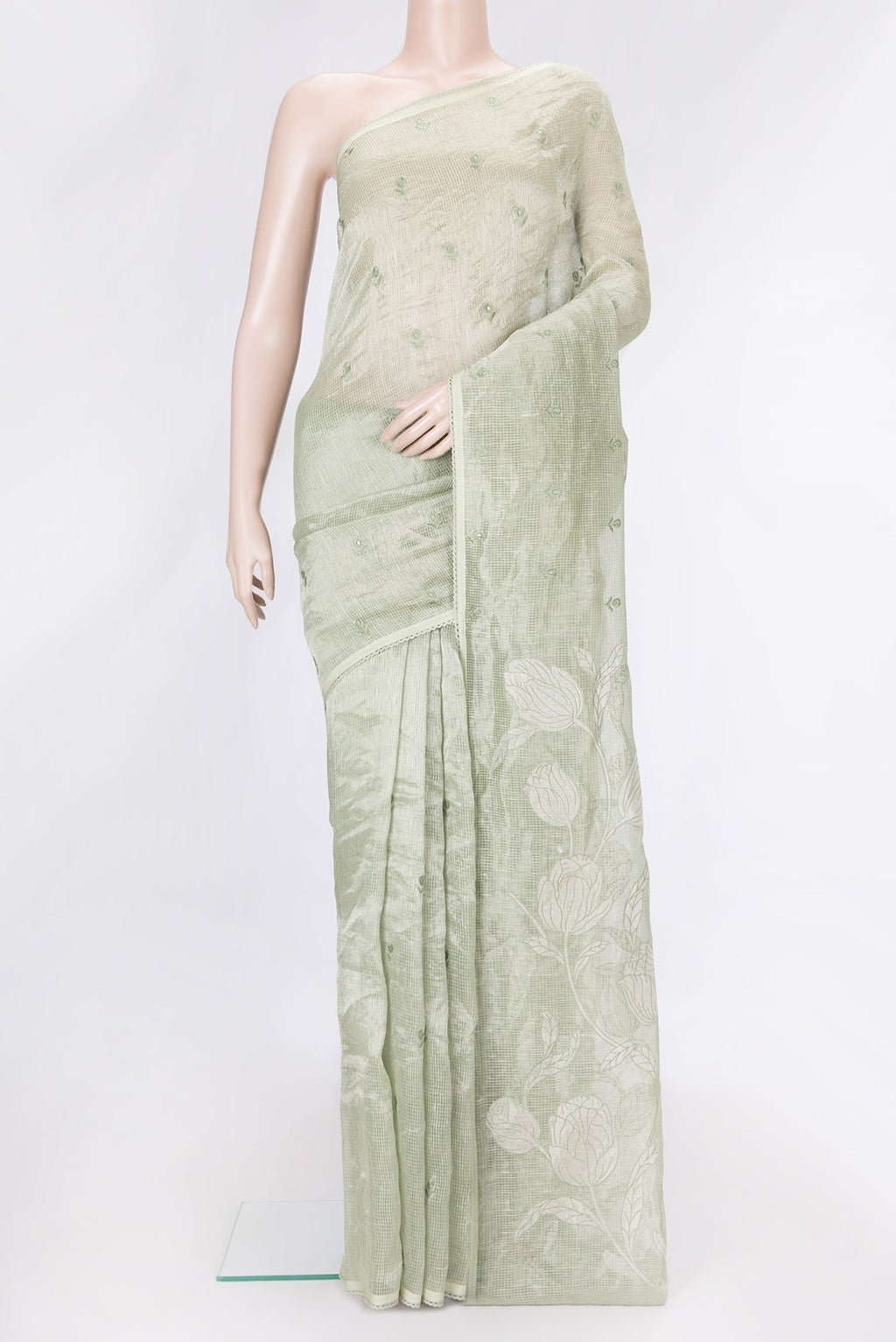 Pista Green Dual Tone Organza Silk Saree with Embroidery on the body and Embroidery Border.  displayed on a mannequin