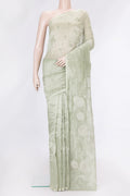 Pista Green Dual Tone Organza Silk Saree with Embroidery on the body and Embroidery Border.  displayed on a mannequin