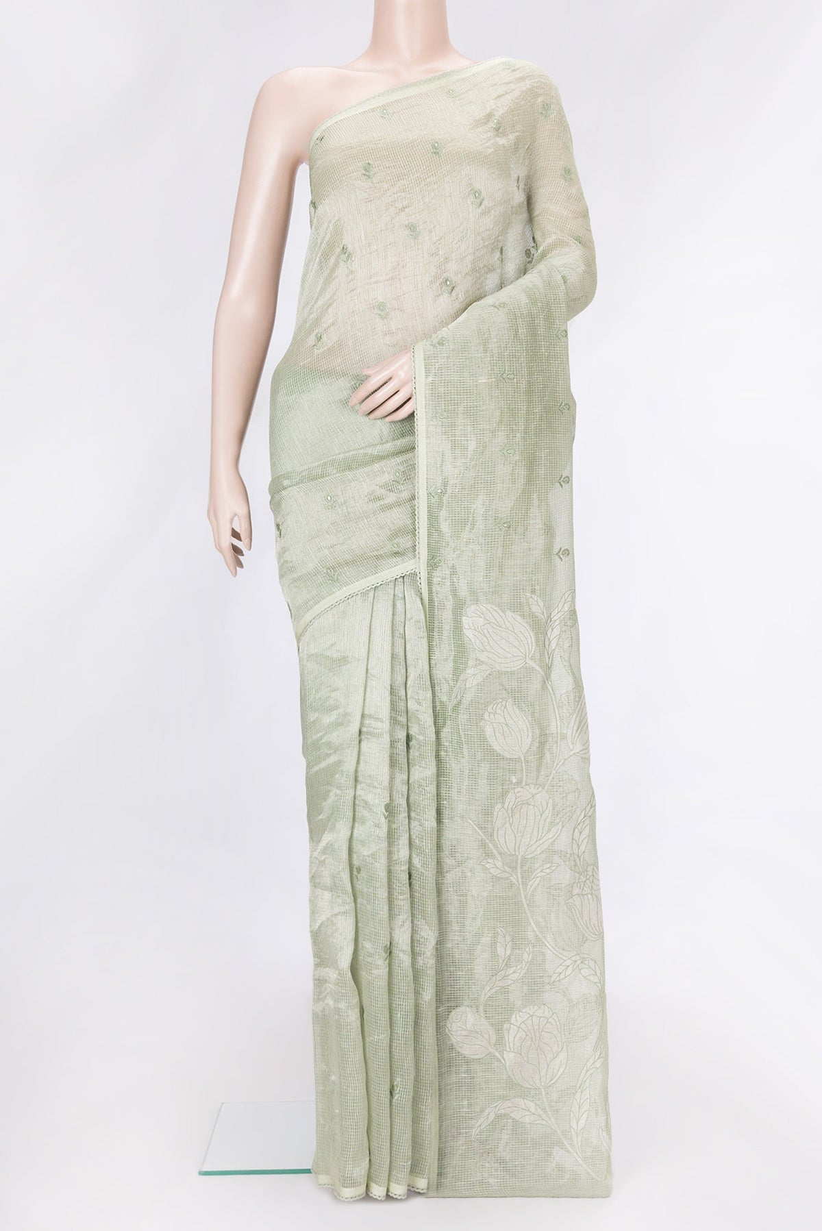 Pista Green Dual Tone Organza Silk Saree with Embroidery on the body and Embroidery Border.  displayed on a mannequin