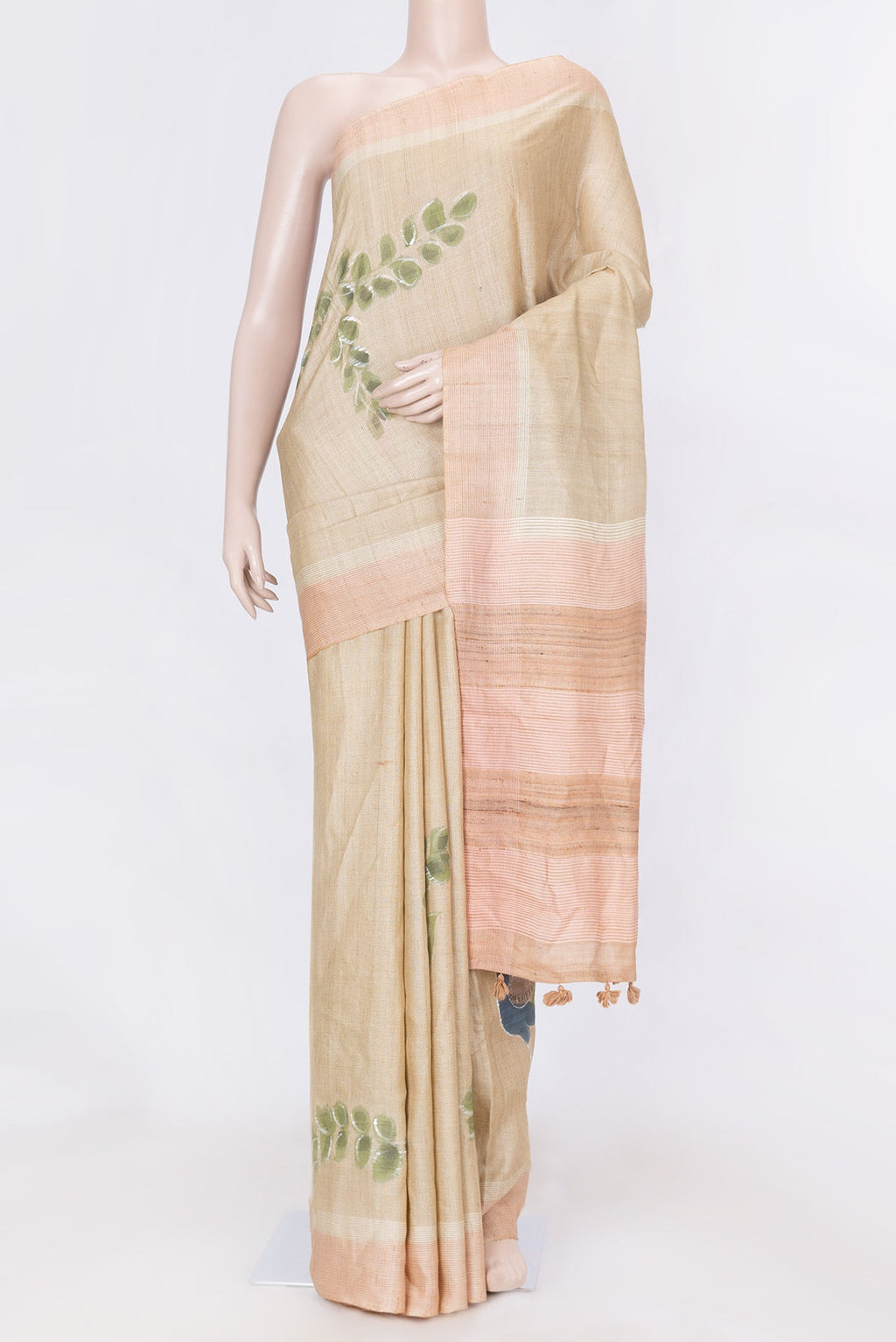 Beige Dual Tone Tussar SareePrinted design on the body and Embroidery Border displayed on a mannequin