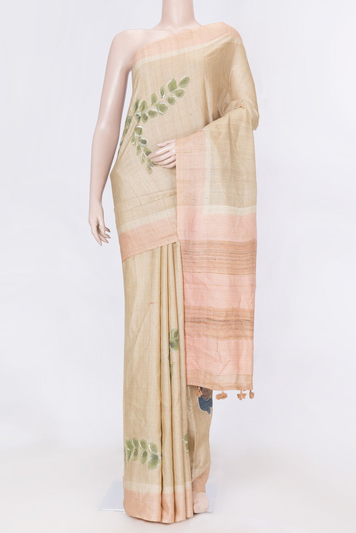 Beige Dual Tone Tussar SareePrinted design on the body and Embroidery Border displayed on a mannequin