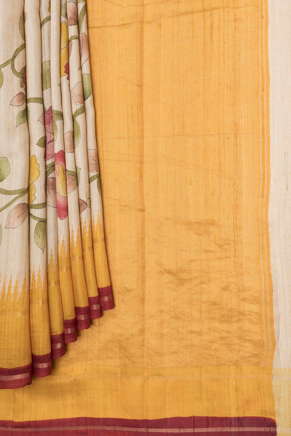 Pleats and pallu of Beige Dual Tone Tussar Saree with Printed design on the body and Zari Border