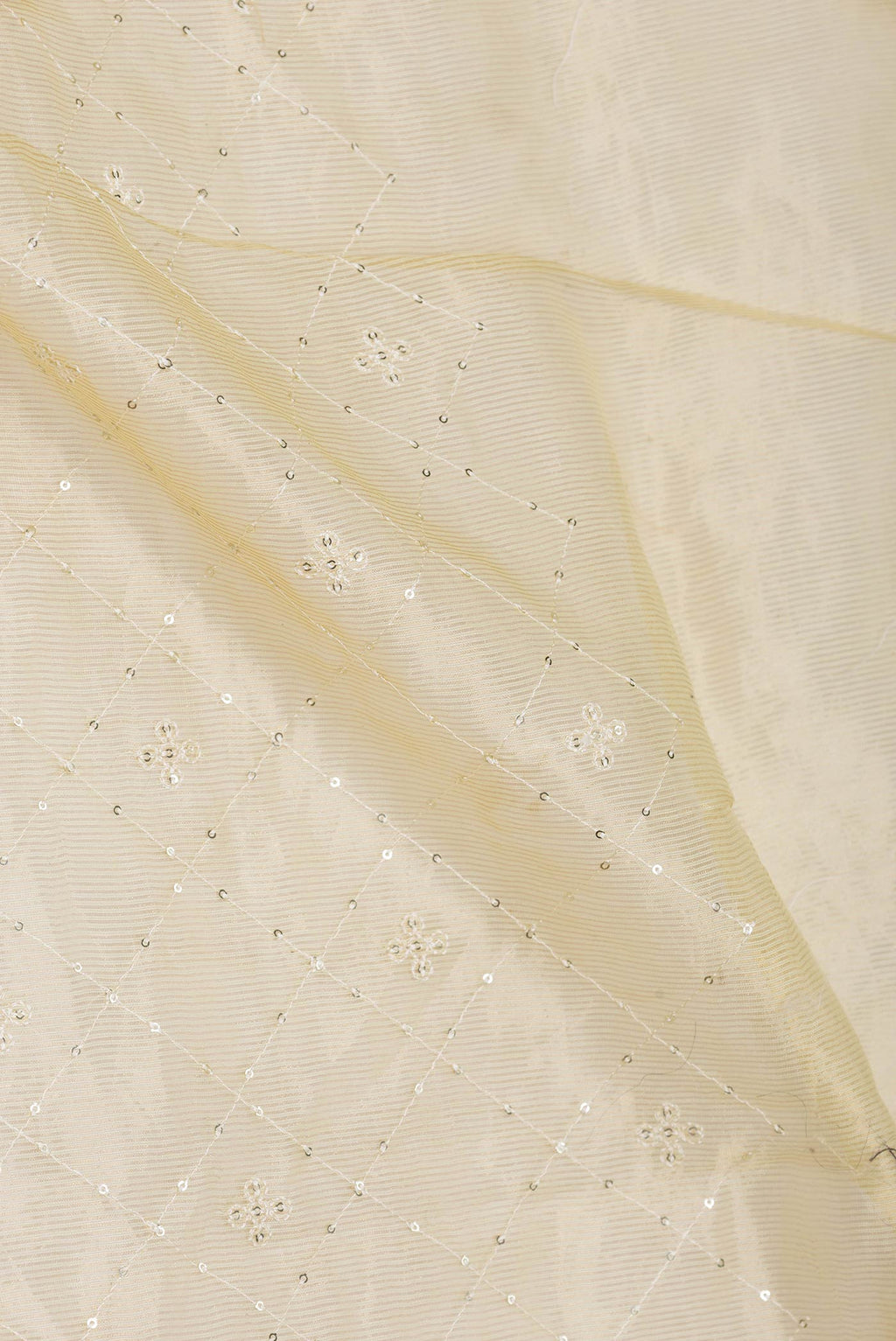 Close up of Yellow Dual Tone Kota Silk Saree with Embroidery on the body and Embroidery Border displaying folds