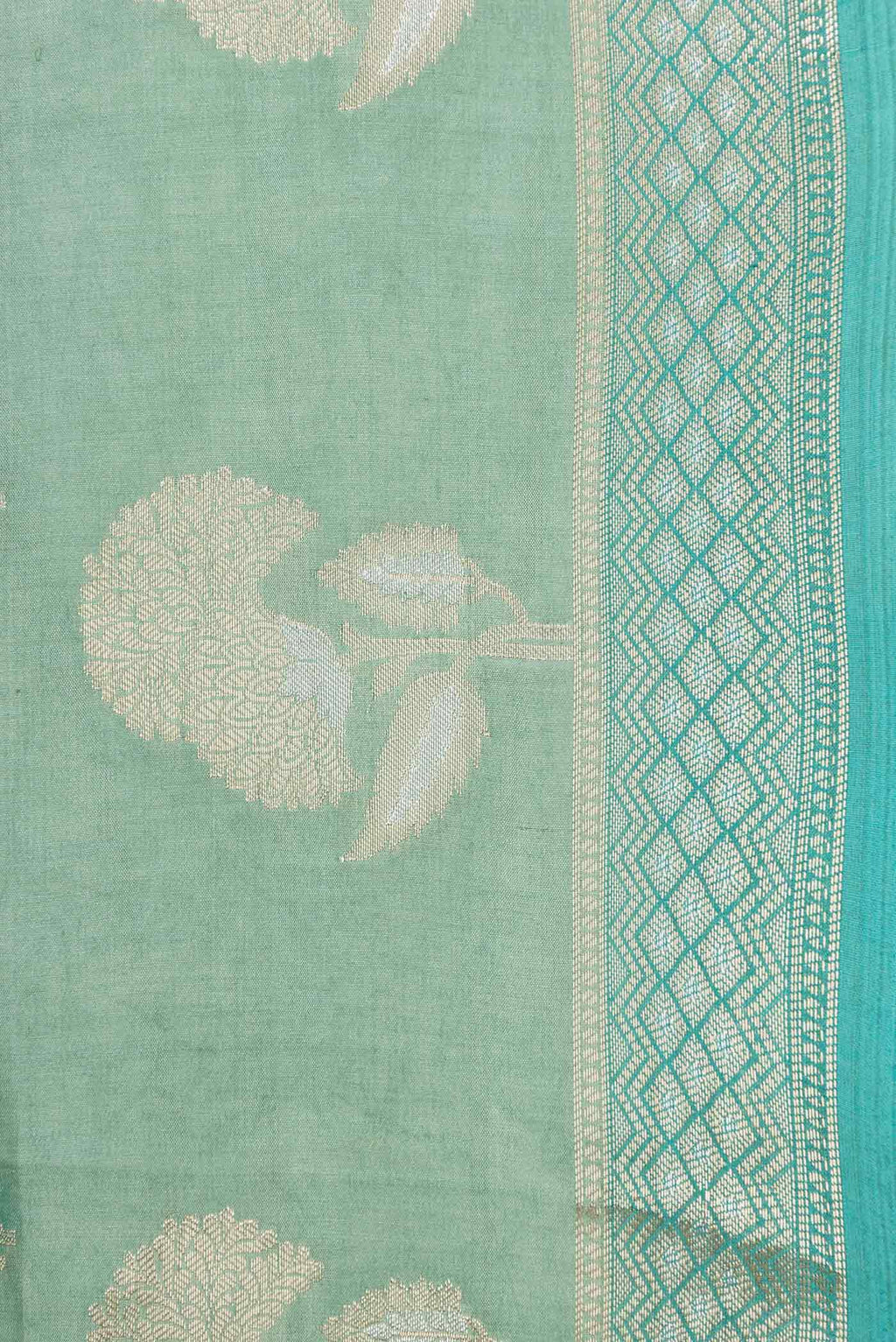 Border image of Green Dual Tone Tussar Silk Saree with Zari Butta on the body and Zari Border