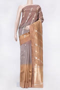 Brown and Sandal Color Tussar Silk Saree with Zari Butta on the body and Plain Border displayed on a mannequin