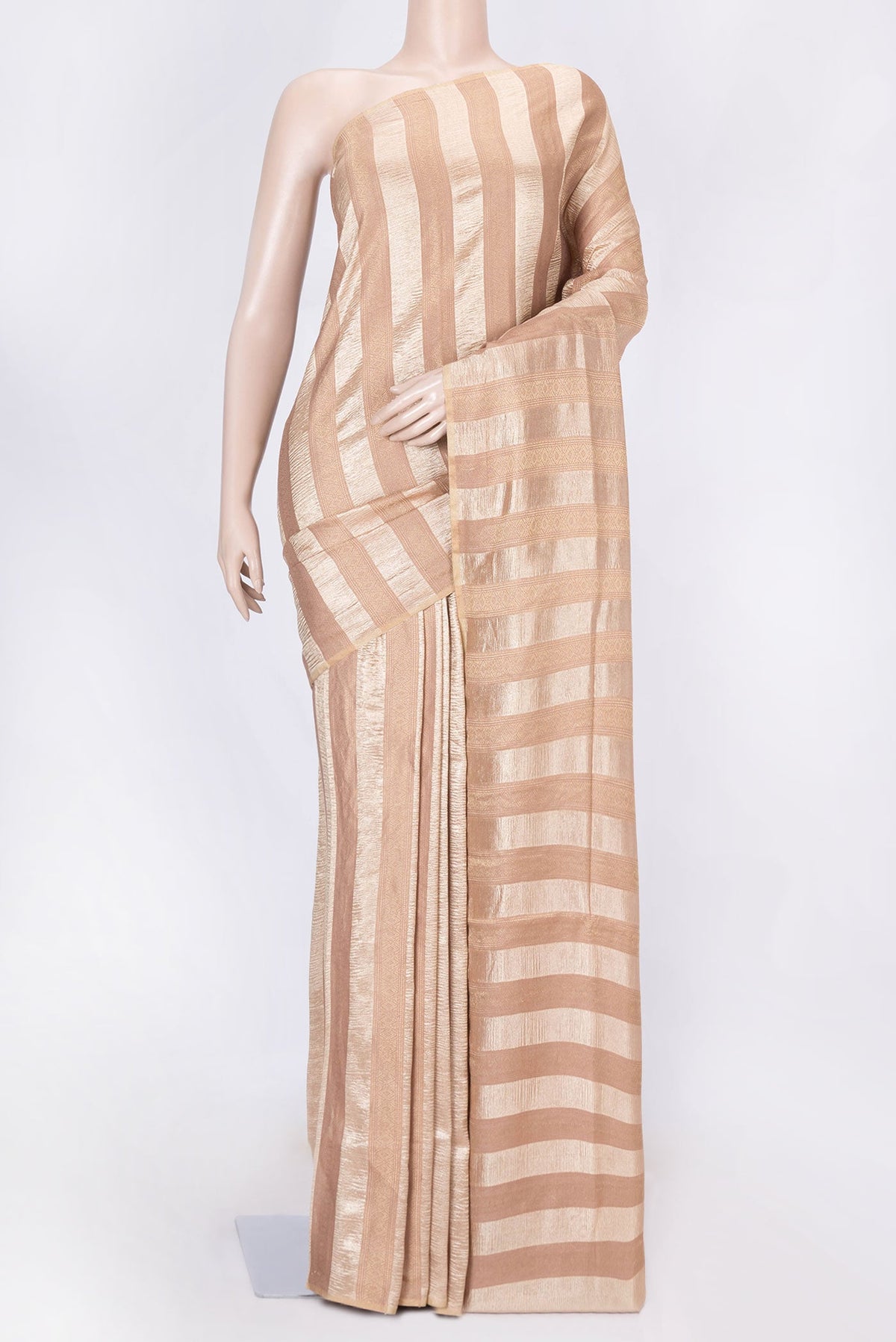Golden Peach Dual Tone Mysore Georgette Saree with Zari Brocade on the body and Zari Border displayed on a mannequin