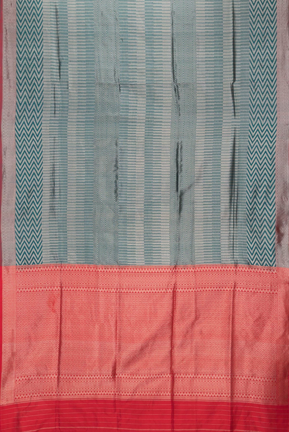 Flat view of Green Dual Tone Banarasi Silk Saree with Zari Brocade on the body and Zari Border. 