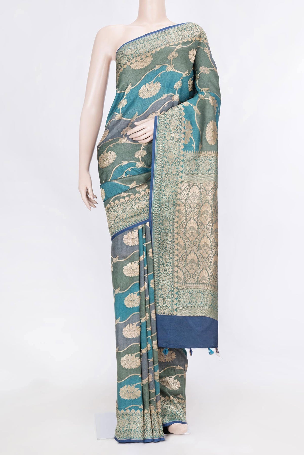 Peacock Blue Dual Tone Banarasi Georgette Saree with Zari Brocade on the body and Zari Border displayed on a mannequin