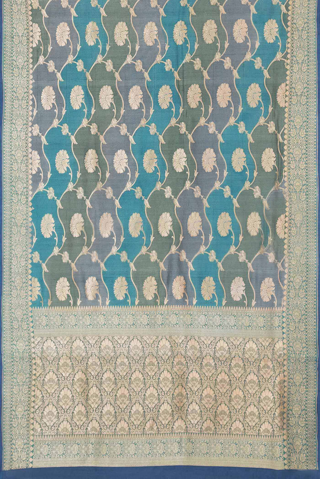 Flat view of Peacock Blue Dual Tone Banarasi Georgette Saree with Zari Brocade on the body and Zari Border