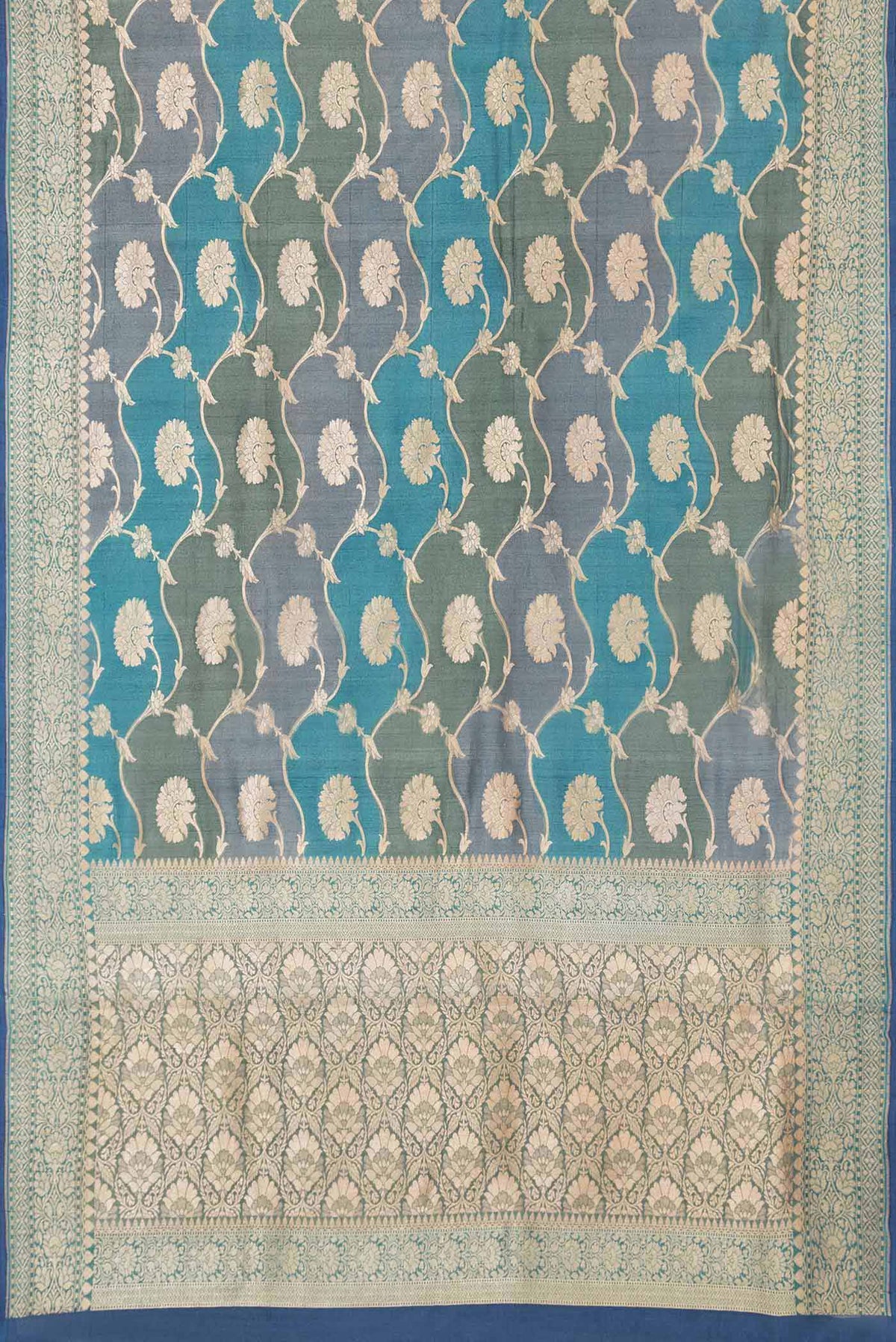 Flat view of Peacock Blue Dual Tone Banarasi Georgette Saree with Zari Brocade on the body and Zari Border