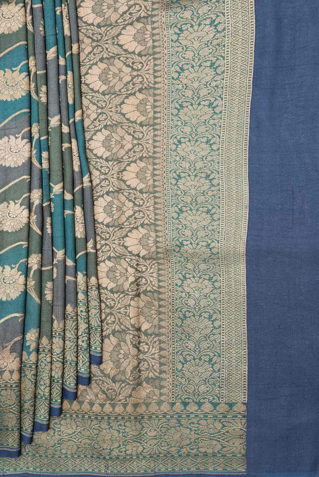 Pleats and pallu of Peacock Blue Dual Tone Banarasi Georgette Saree with Zari Brocade on the body and Zari Border