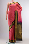Pink Kanchipuram Silk Saree with Zari Butta on the body and Zari Border displayed on a mannequin
