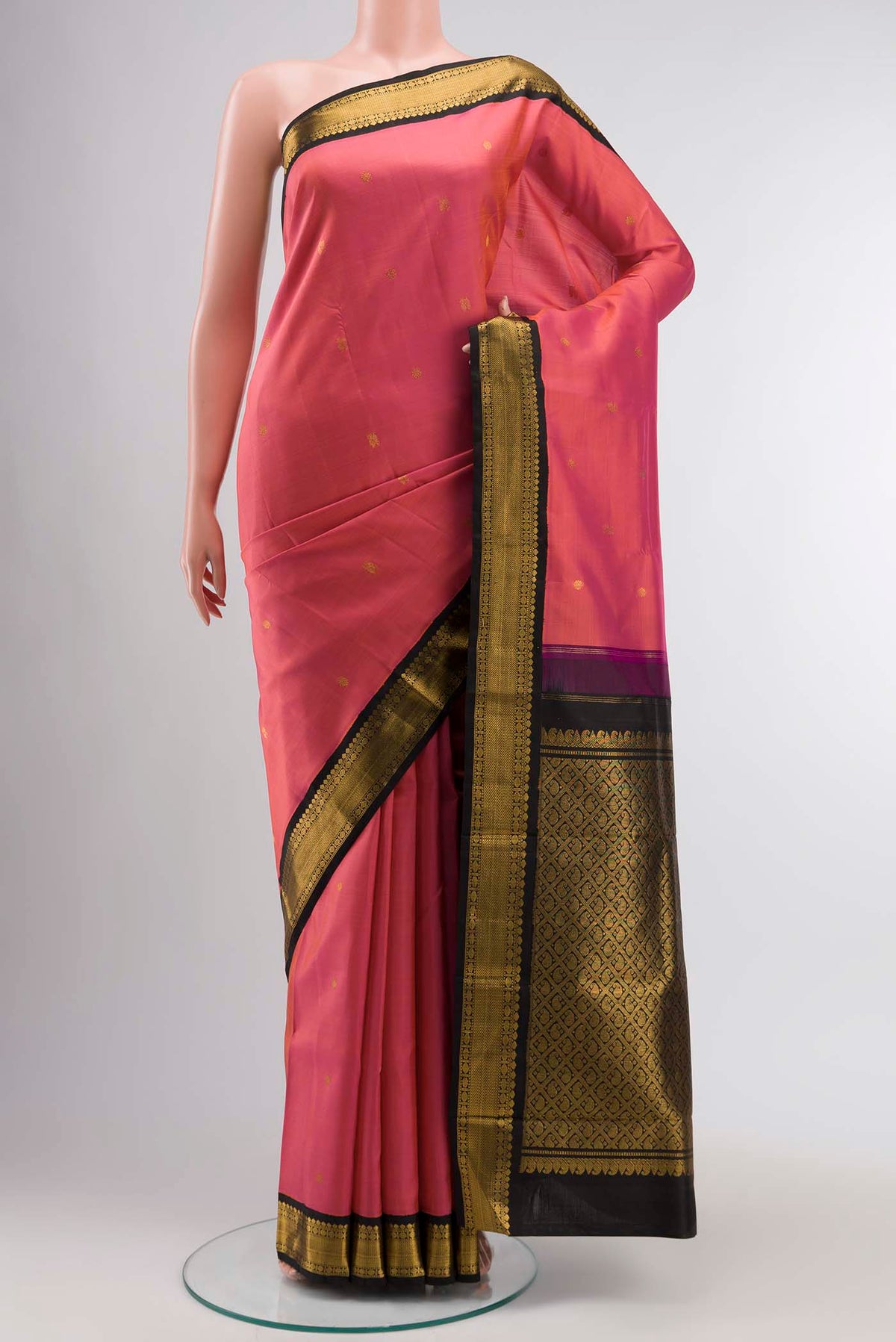 Pink Kanchipuram Silk Saree with Zari Butta on the body and Zari Border displayed on a mannequin