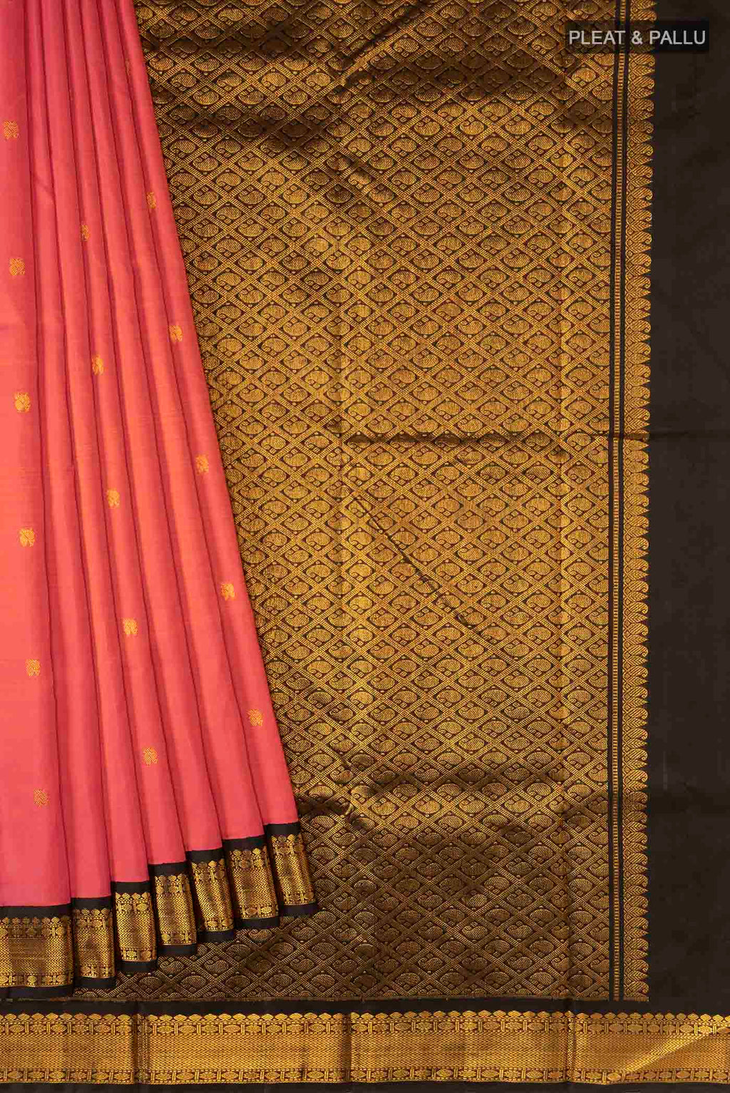 Pleats and pallu of Pink Kanchipuram Silk Saree with Zari Butta on the body and Zari Border