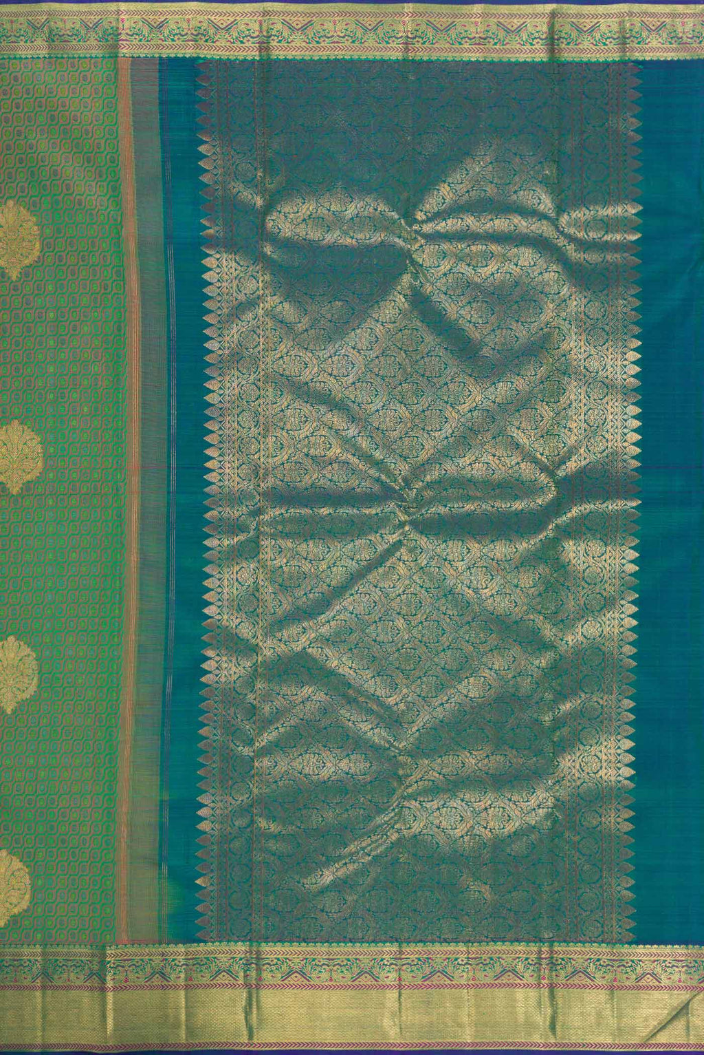 Close up image of the pallu of Pure Silk Pure Zari Green Dual Tone Kanchipuram Saree with Jacquard With Zari Butta on the body and Zari Border. 