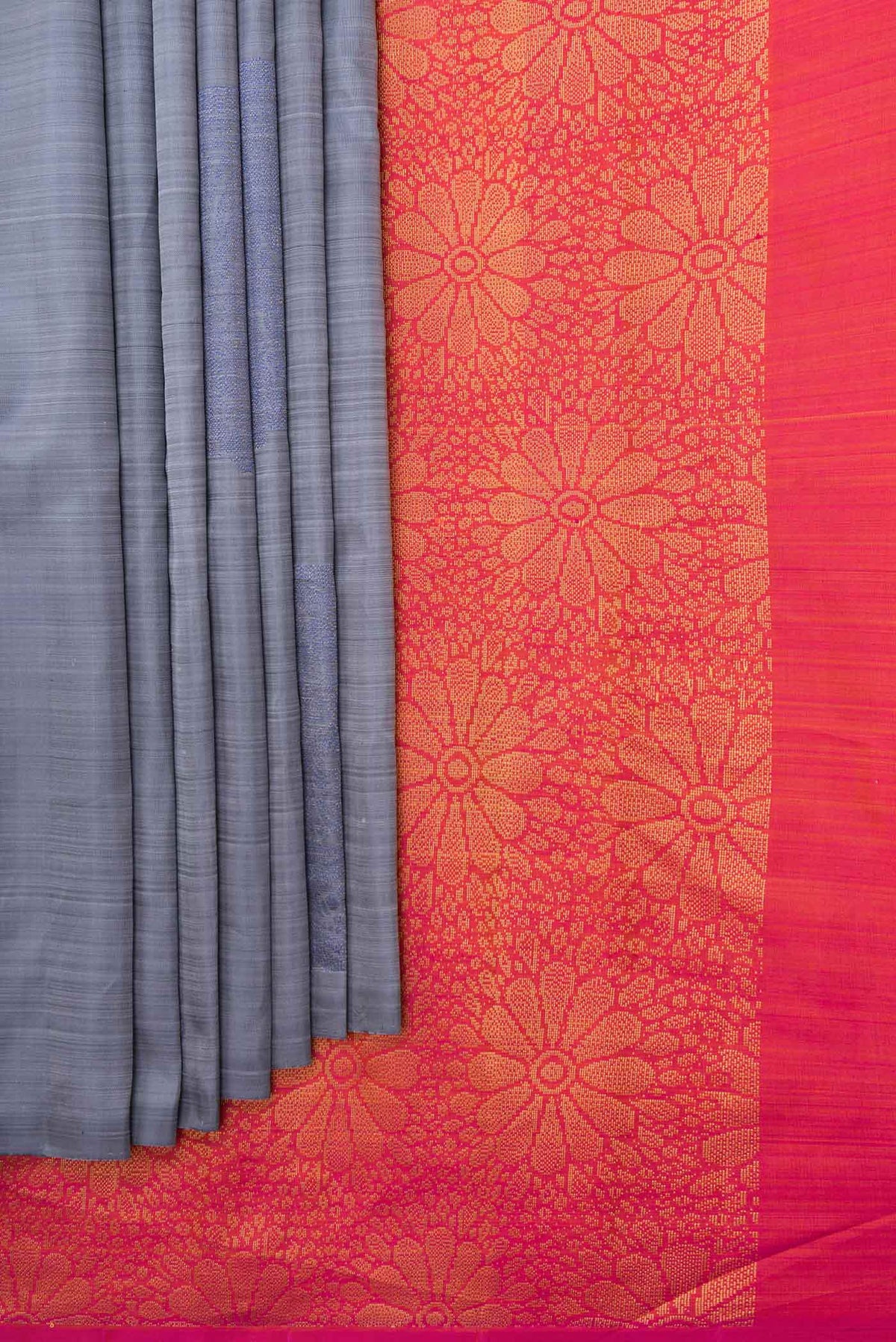 Pleats and pallu of Grey Dual Tone Kanchipuram Saree with Zari Butta on the body and Without Border