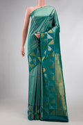 Peacock Blue Dual Tone Kanchipuram Silk Saree with Zari Brocade on the body and Fancy Border displayed on a mannequin