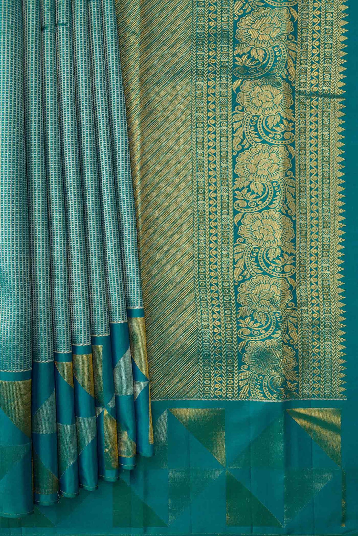 Pleats and pallu of Peacock Blue Dual Tone Kanchipuram Silk Saree with Zari Brocade on the body and Fancy Border