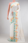 White Double Ikat Saree with Plain Body and Ikat Border.  displayed on a mannequin