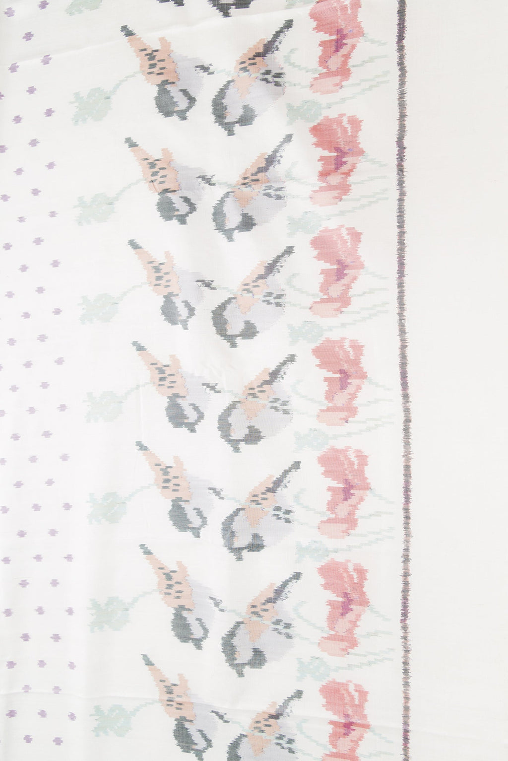 Border image of White Dual Tone Rajkot Patola Silk Saree with Ikat Print on the body and Ikat Border. 