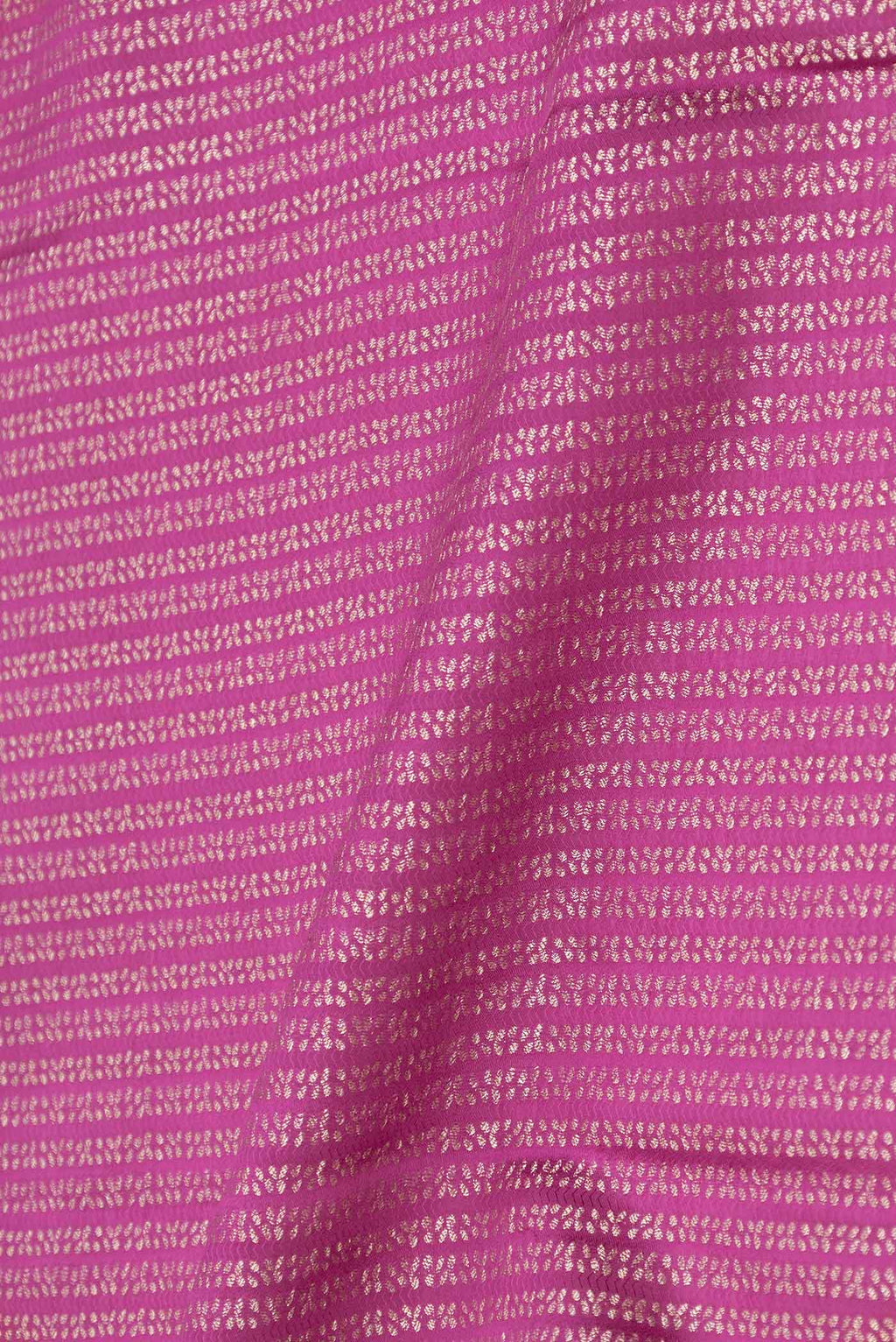 Close up of Magenta Mysore Crepe Saree with Stripes on the body and Zari Border displaying folds