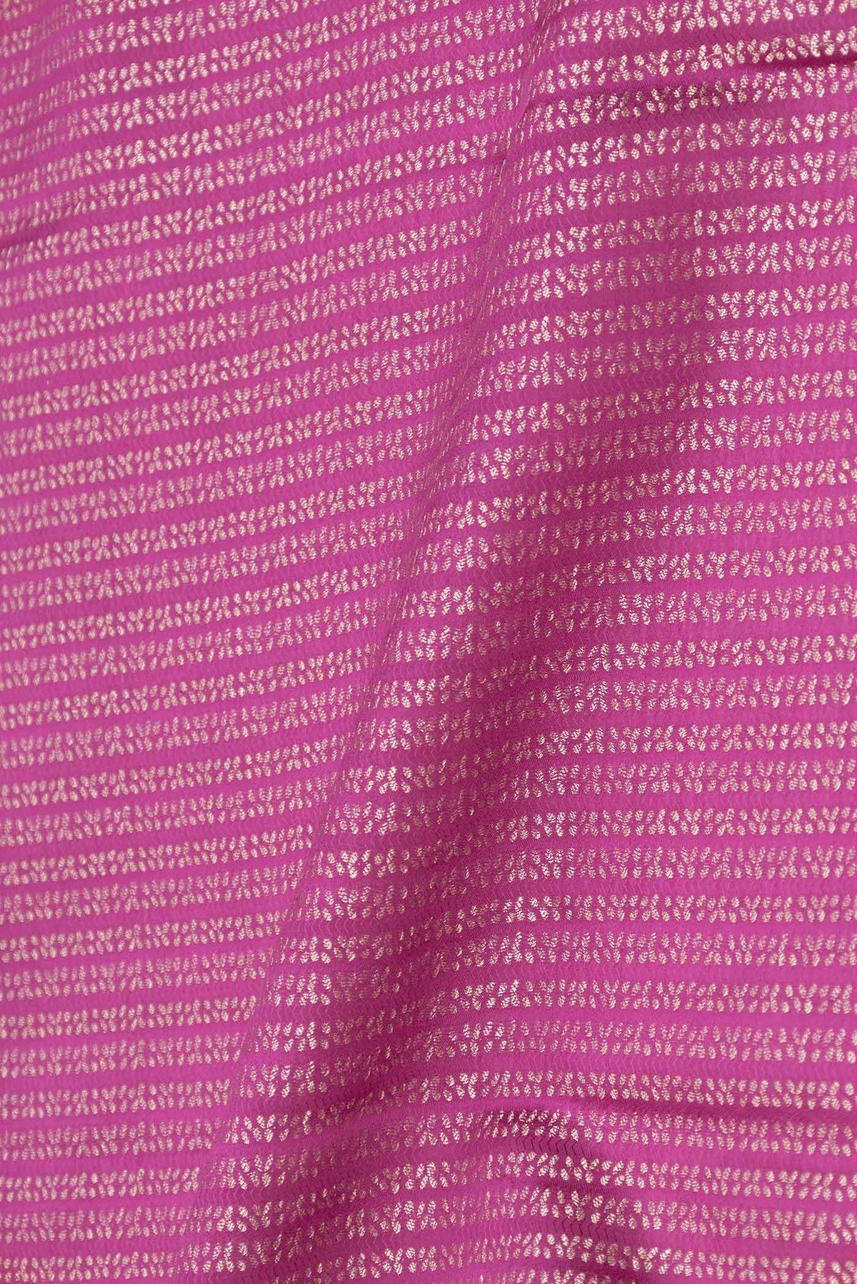 Close up of Magenta Mysore Crepe Saree with Stripes on the body and Zari Border displaying folds