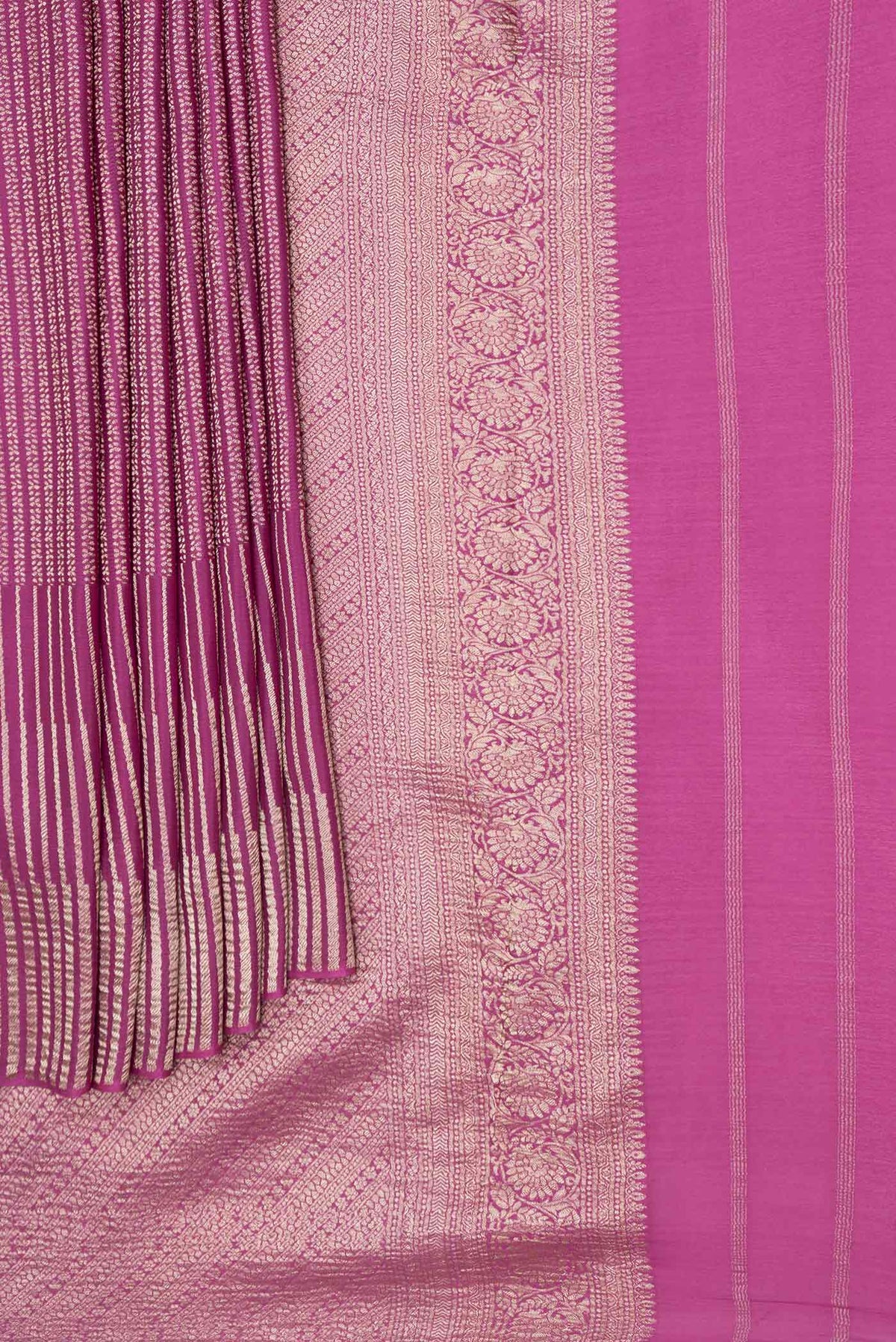 Pleats and pallu of Magenta Mysore Crepe Saree with Stripes on the body and Zari Border