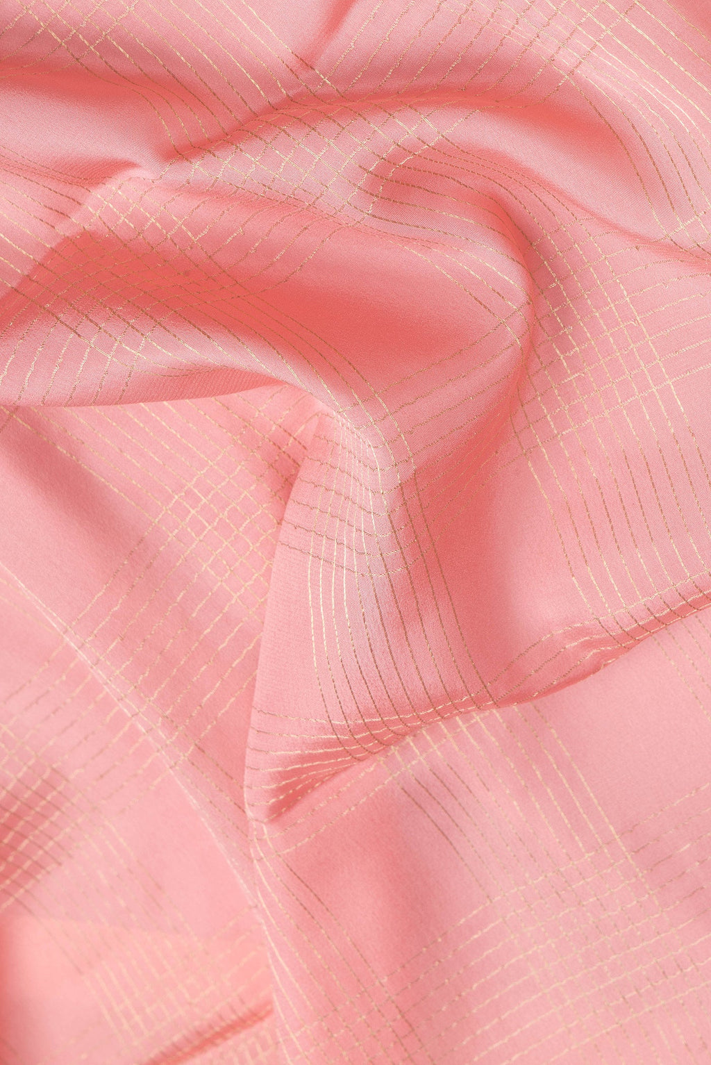Close up of Pink Dual Tone Mysore Silk Saree with Checked design on the body and Zari And Thread Border.  displaying folds