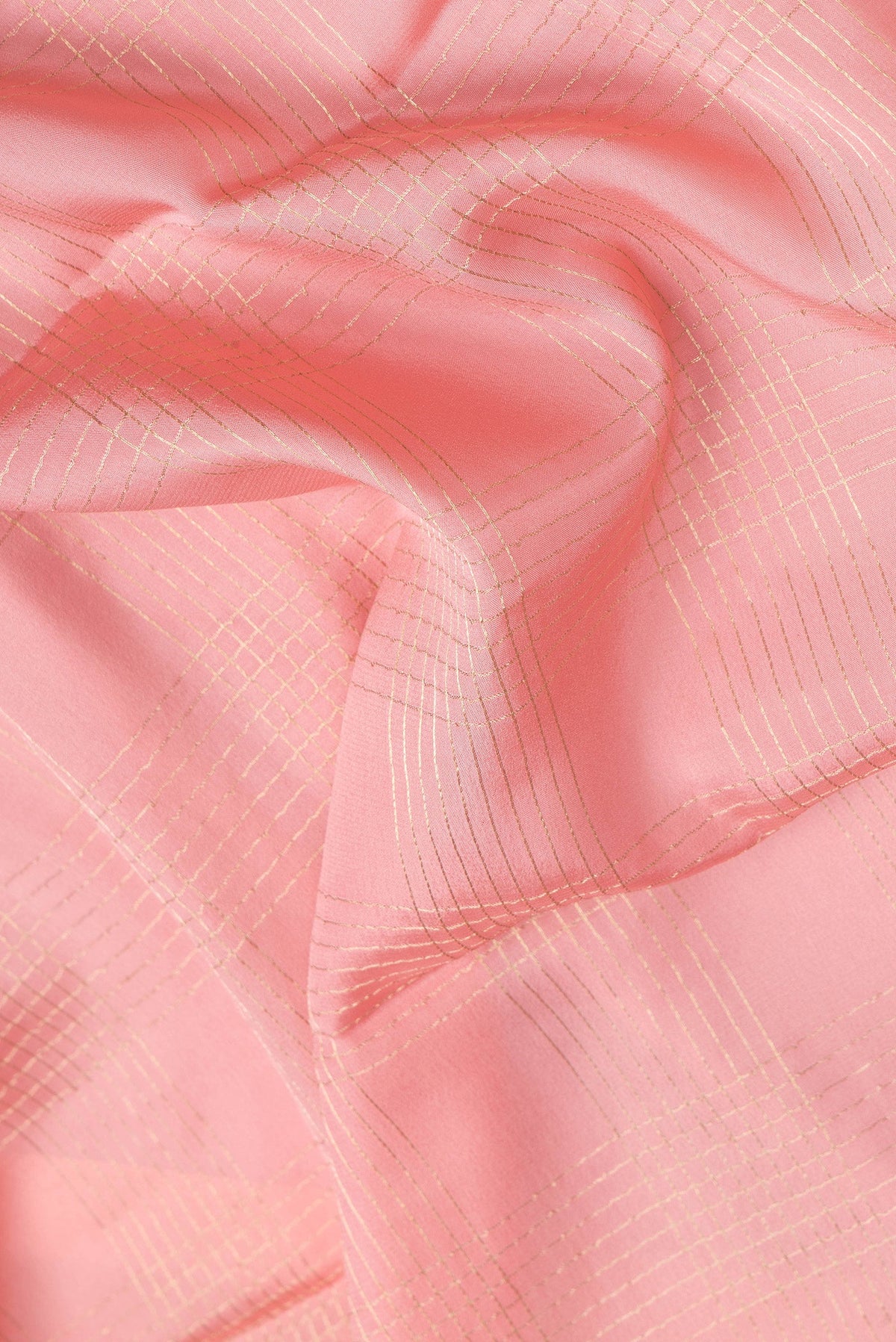Close up of Pink Dual Tone Mysore Silk Saree with Checked design on the body and Zari And Thread Border.  displaying folds