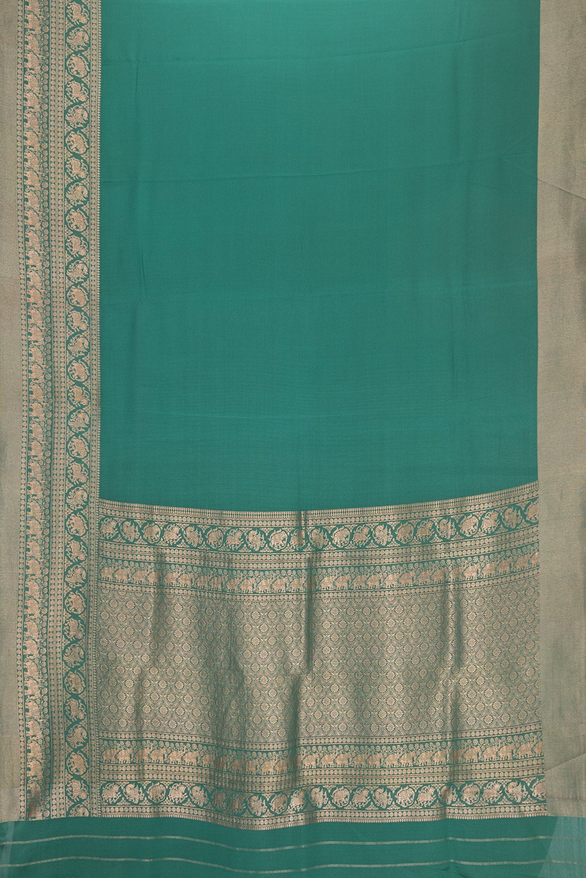 Flat view of Bottle Green Dual Tone Mysore Crepe Saree with Plain Body and Fancy Border. 