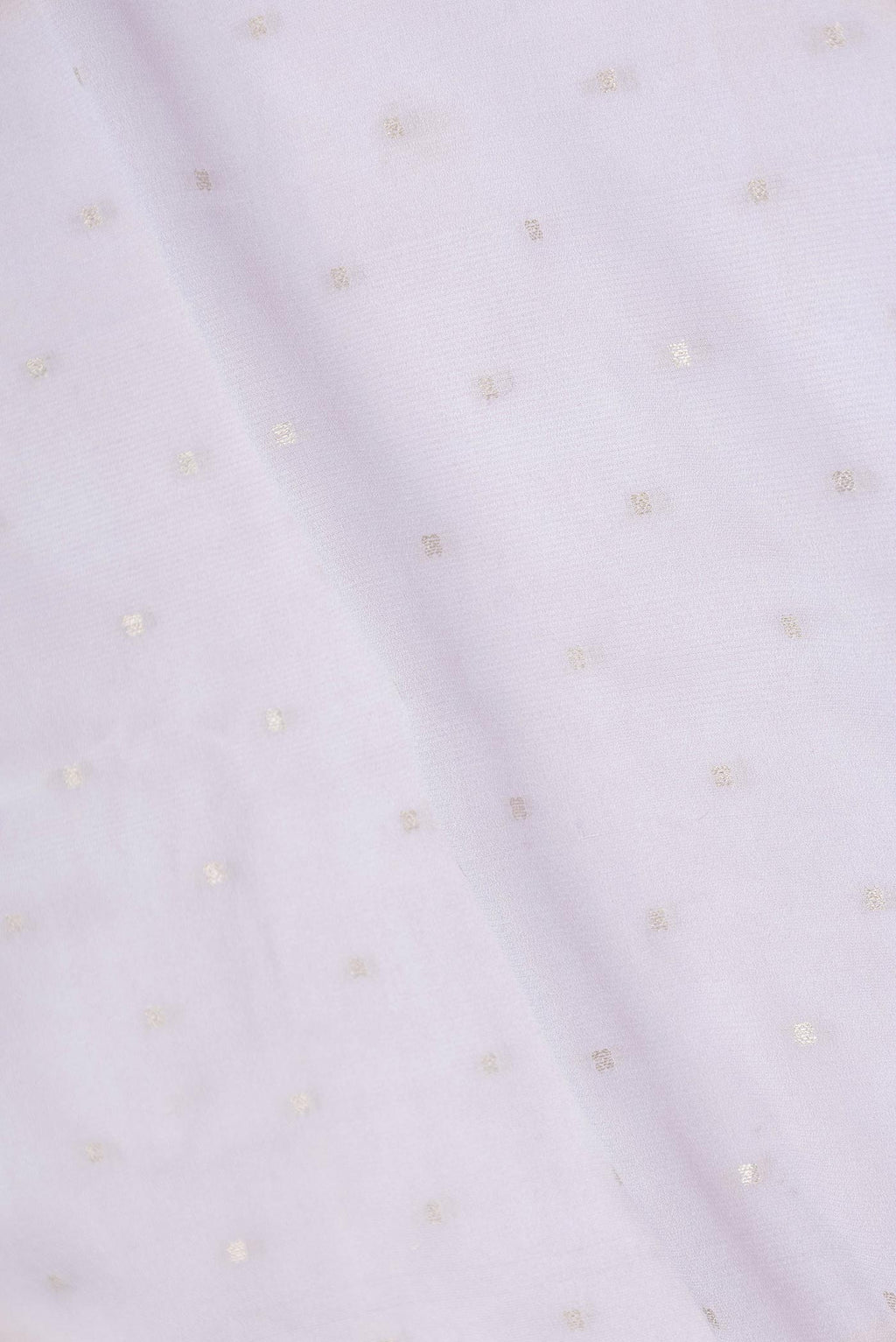 Close up of Grey Dual Tone Banarasi Georgette Saree with Zari Butta on the body and Zari And Thread Border displaying folds