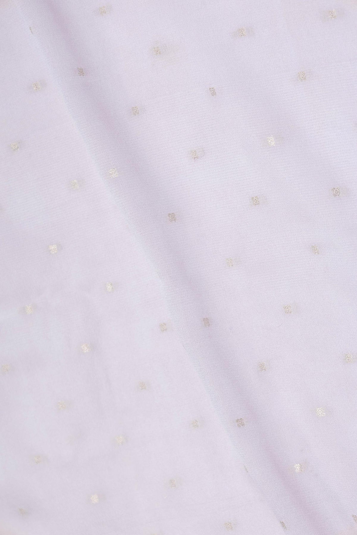 Close up of Grey Dual Tone Banarasi Georgette Saree with Zari Butta on the body and Zari And Thread Border displaying folds