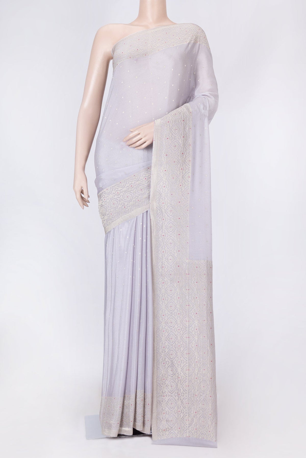 Grey Dual Tone Banarasi Georgette Saree with Zari Butta on the body and Zari And Thread Border displayed on a mannequin