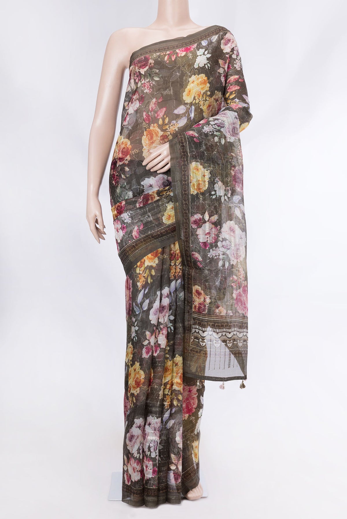 Brown Organza Silk Saree with Embroidery on the body and Embroidery Border displayed on a mannequin