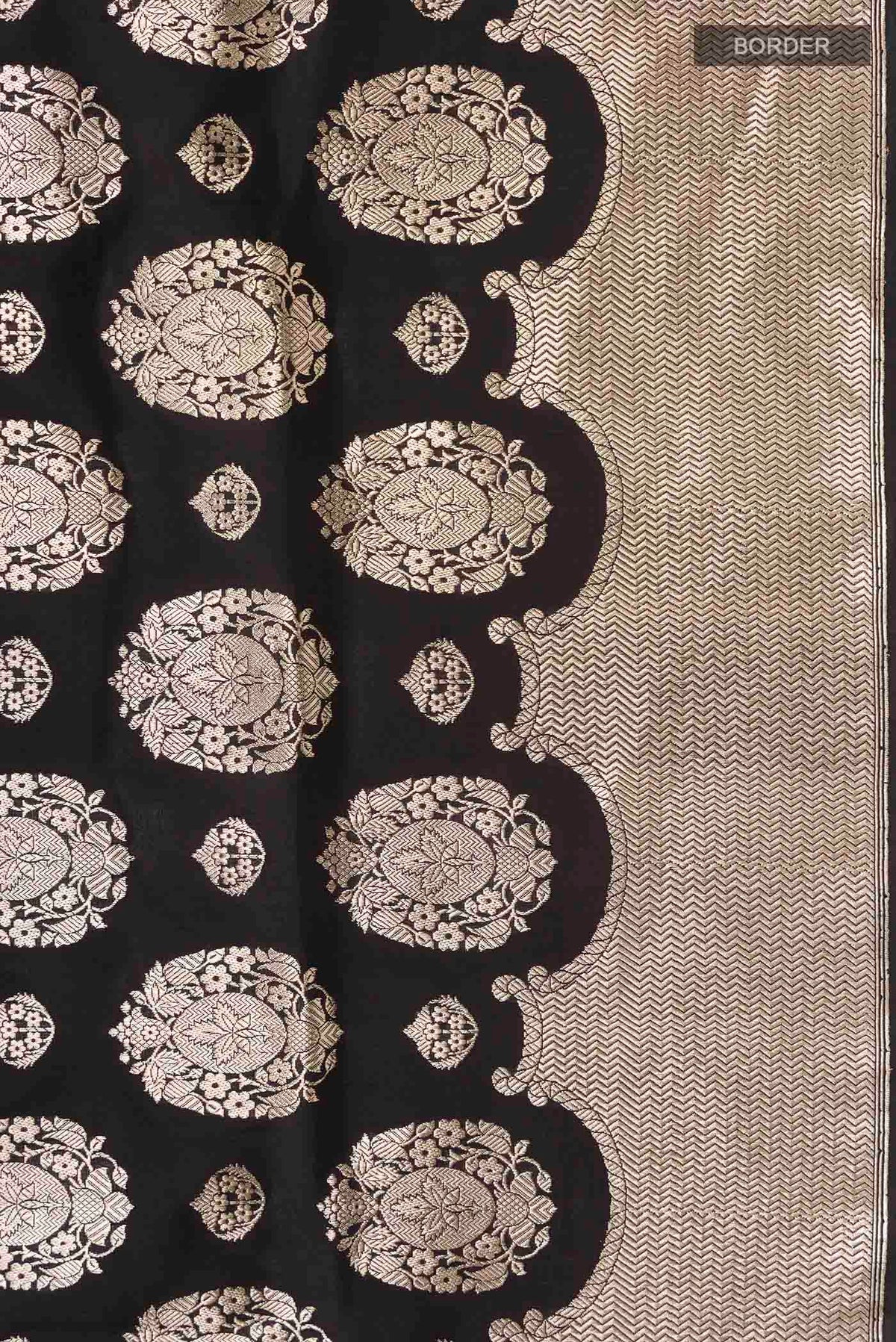 Border image of Black Banarasi Silk Saree with Zari Butta on the body and Zari Border